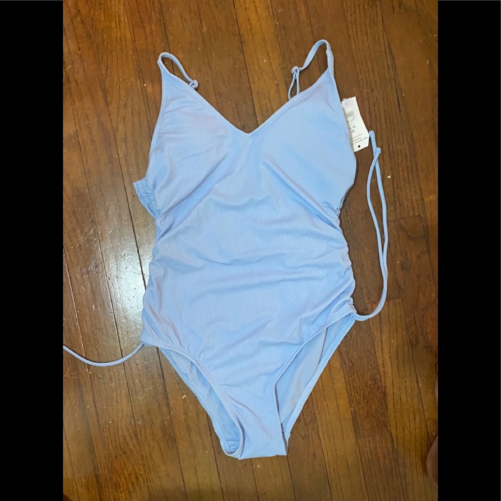 Blue one piece bathing suit with strings